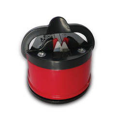 Table sharpener for knives and scissors with vacuum base