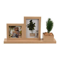 Photo frames 2 pcs on a stand with an artificial plant