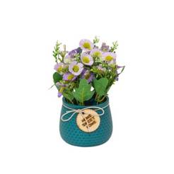 Daisy arrangement in a blue pot 22.5 cm