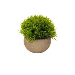 Arrangement of artificial grass in a round pot